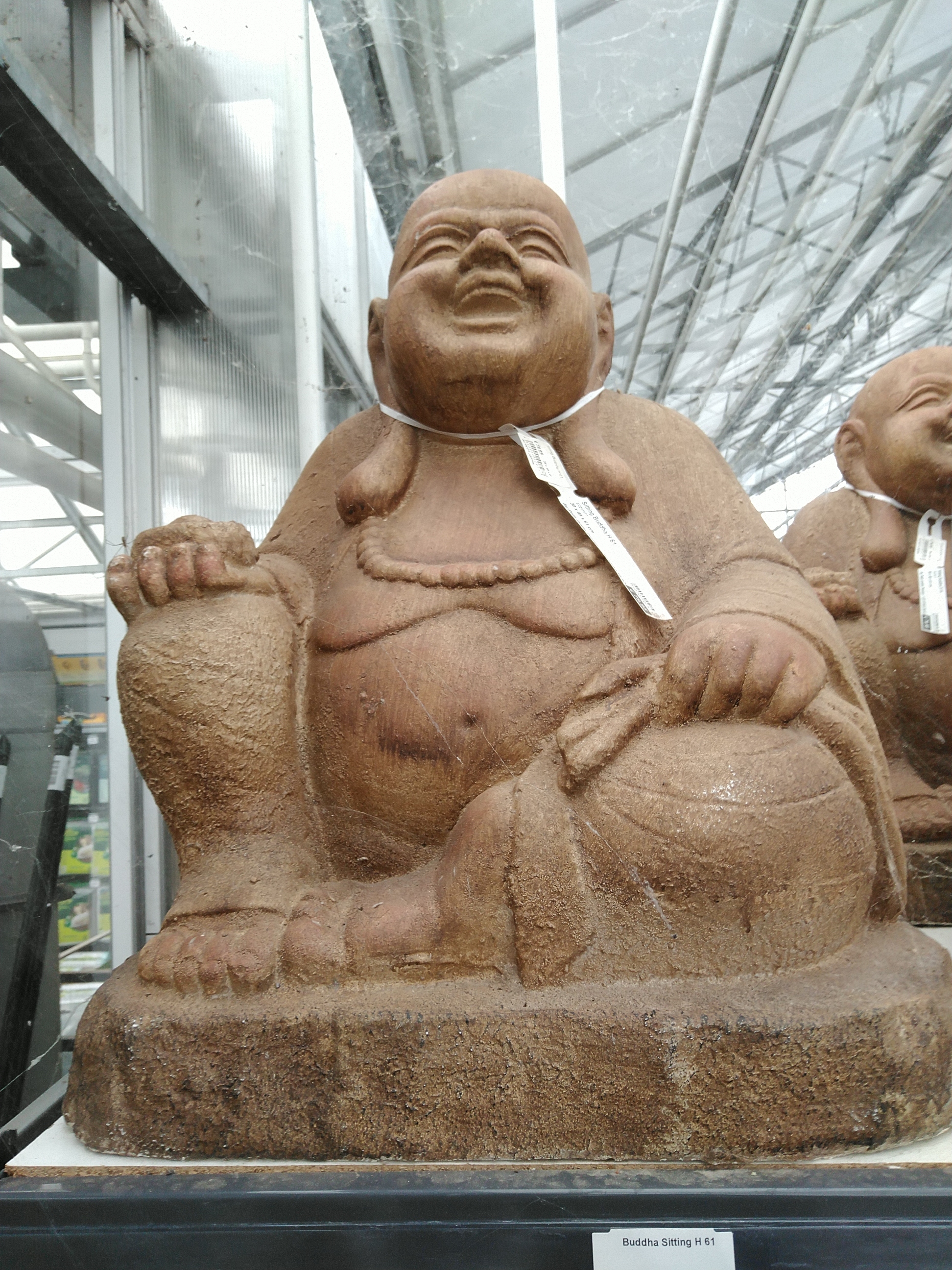 Buddha  Sitting  H 61